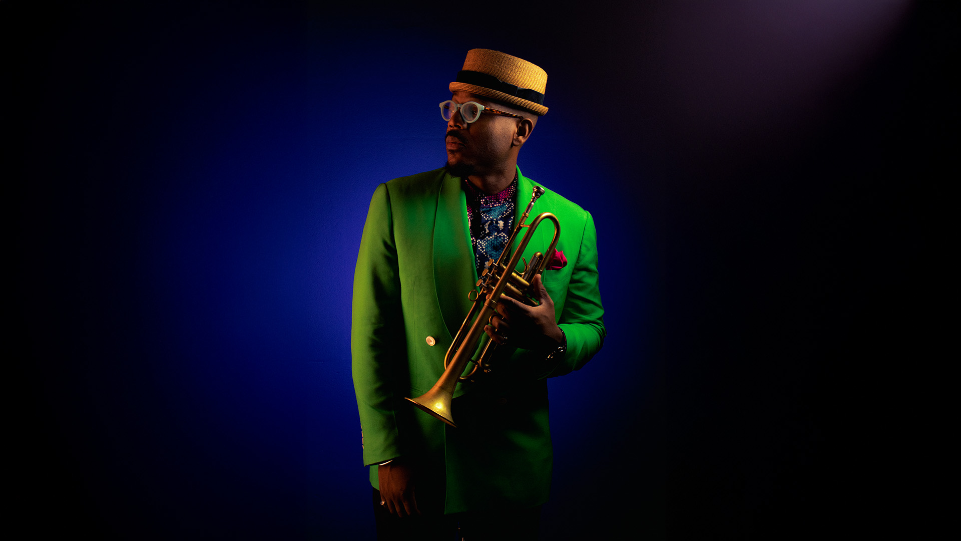 Photo of musician Etienne Charles with his trumpet