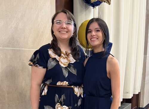 Photo of Terra and Lexie at a First-Gen graduation celebration