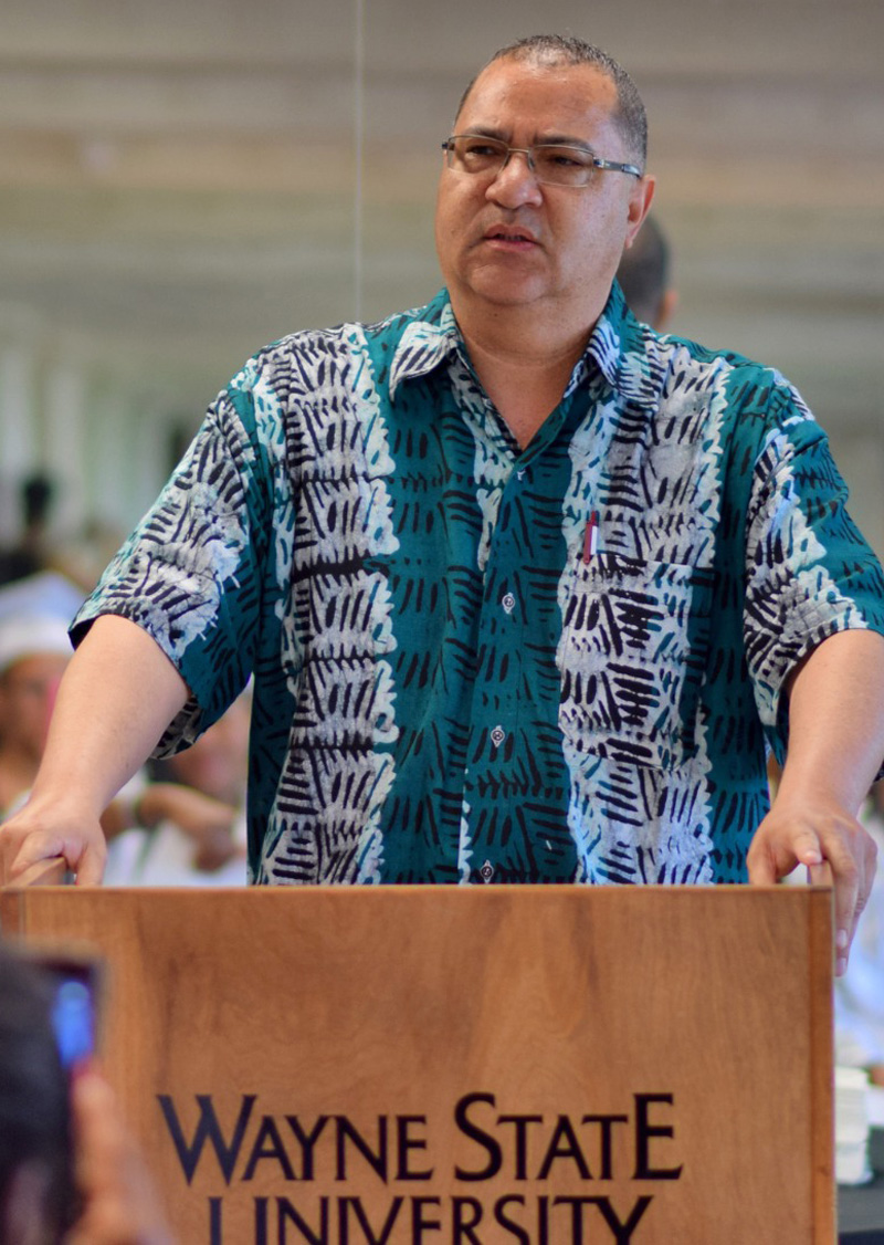 Ollie johnson addressing an audience
